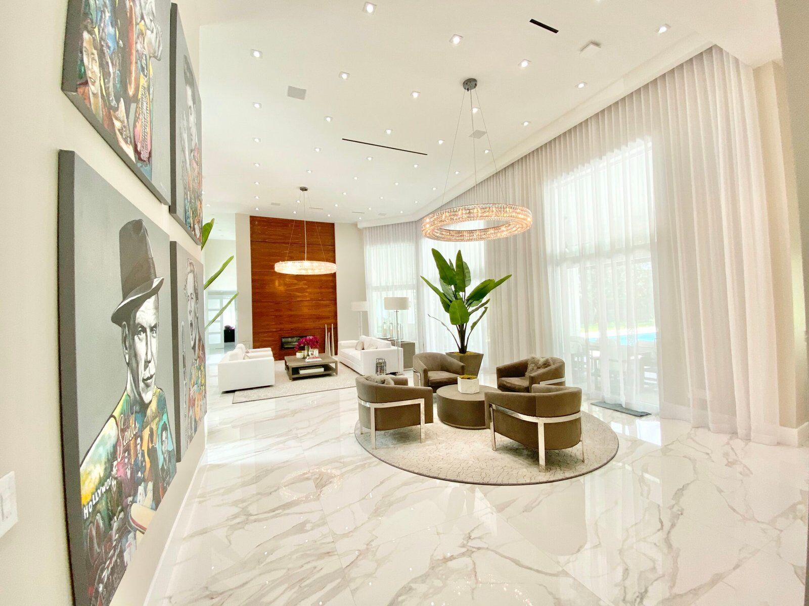 Woman walking into a luxury home with a dog
