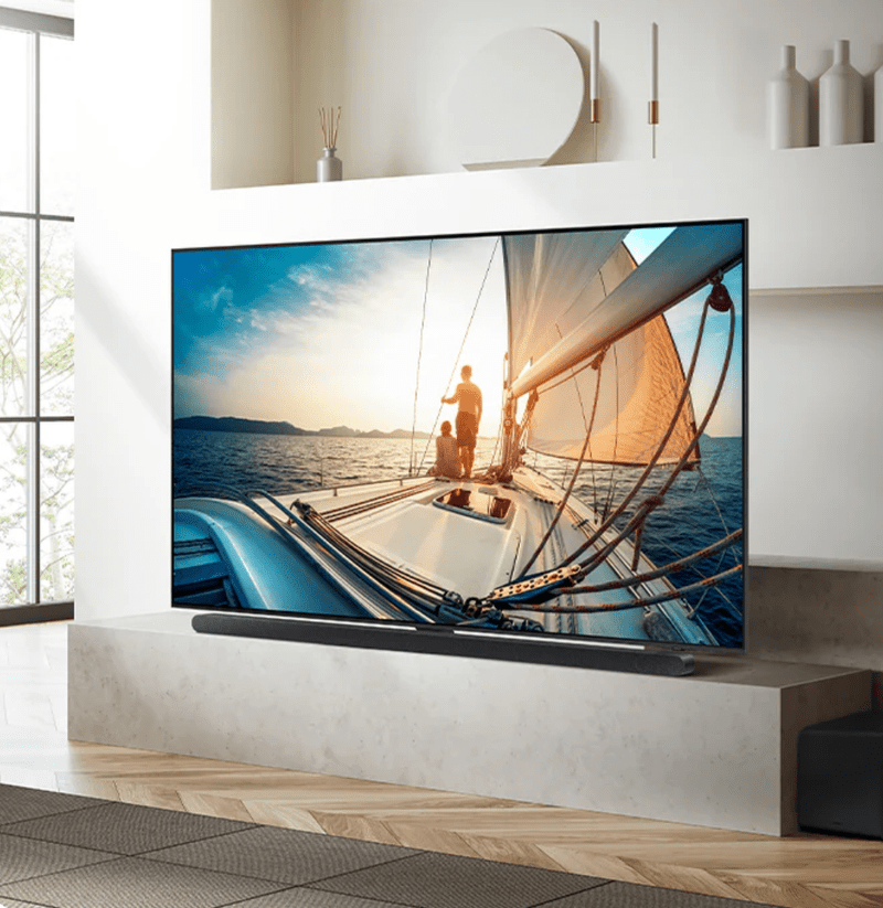 wall mounted ultra-thin TV installation with matching architectural soundbar