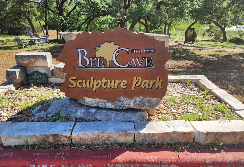 Bee Cave Sculpture Park entrance sign near Spanish Oaks Texas